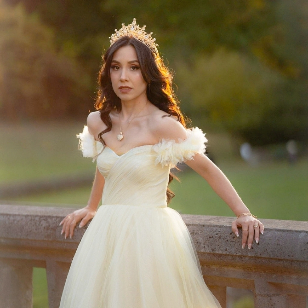 One-Shoulder Cream Tulle Gown with Floral Accent